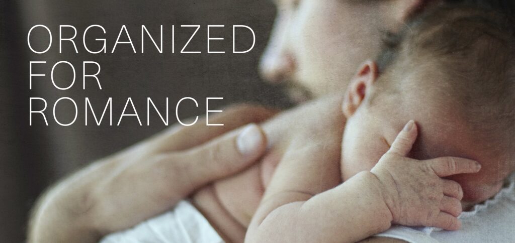 Man cuddling a baby